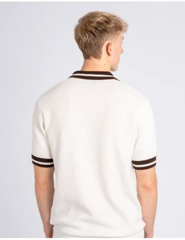 St. Pauli - Knitted jersey - White FC St. Pauli knitted jersey Colour: cream-white Material composition: 100% organic cotton Fairtrade + Fairwear FCSP Sustainable Product: Sustainable material Origin: Made in Portugal Manufacturer: FC St. Pauli Merchandising GmbH &amp; Co. KG, Harald-Stender-Platz 1, 20359, Hamburg, info@fcsp-shop.comHere you can find the complete selection of St. Pauli jerseys in our shop. No Borders