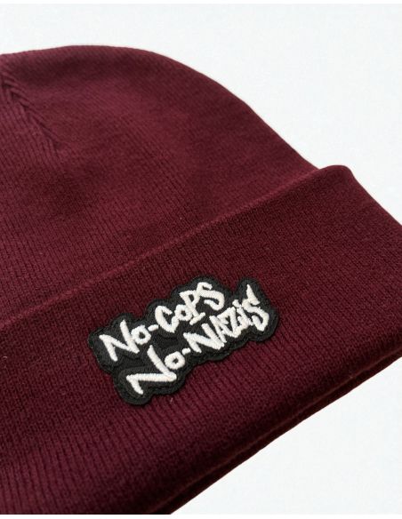 ncnn-mob-action-beanie-patch-burgundy-detail ncnn-mob-action-beanie-patch-burgundy-detail