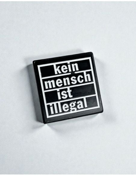 kmii-no-borders-pin
